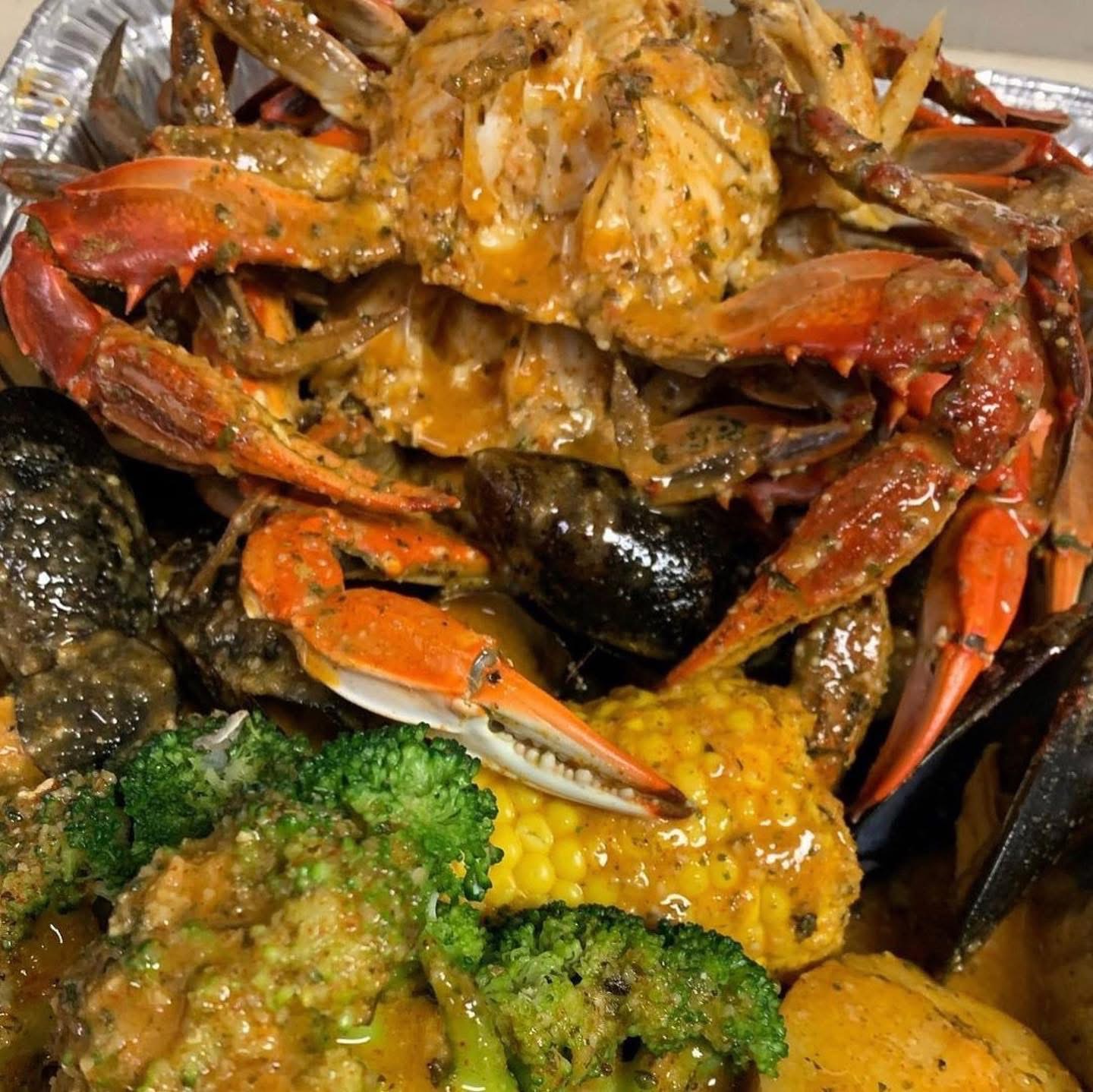 Grant’s blue crabs with garlic butter, corn, broccoli and potatoes
