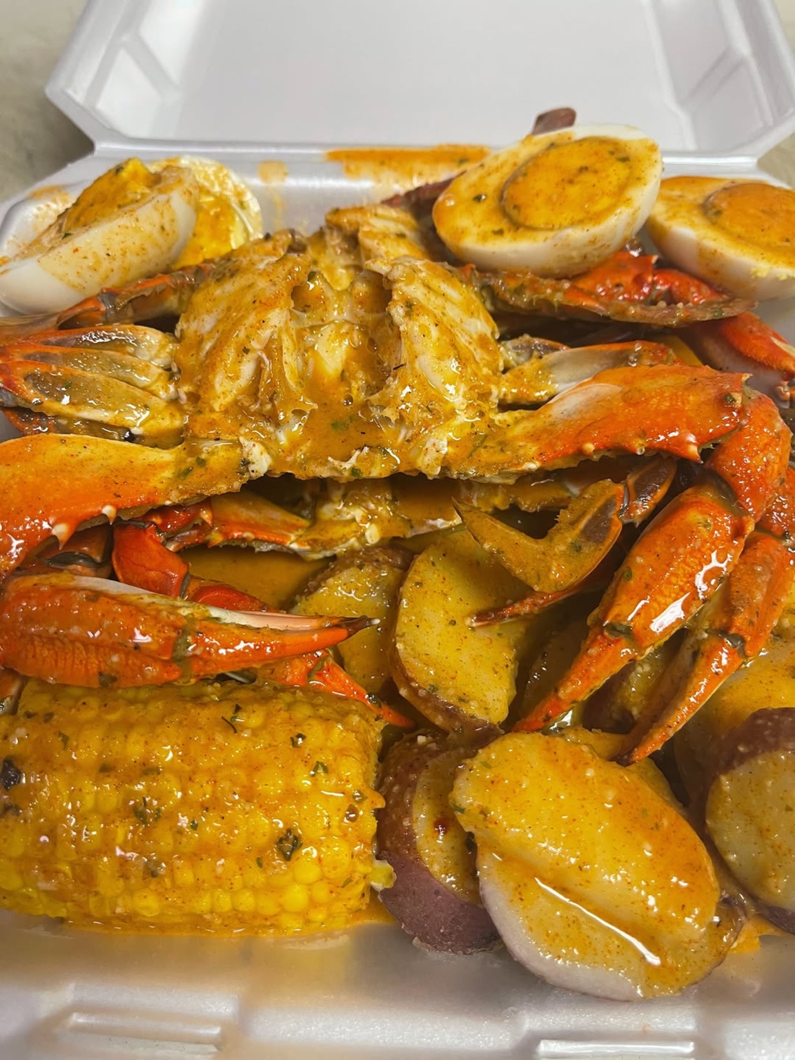 Grant’s blue crab tray with eggs, corn and garlic potatoes
