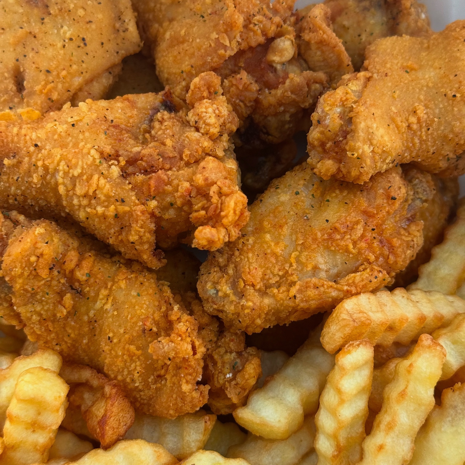 Grant’s fried chicken wings with crinkle-cut fries